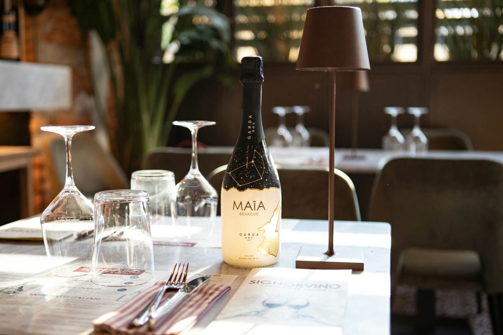 A bottle of wine on a restaurant table