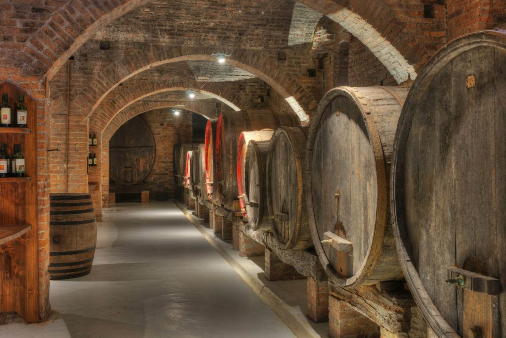 Barrels in a Valpolicella wine cellar